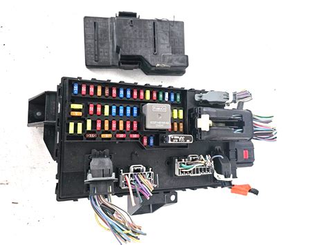 2014 ford fusion smart junction box location|Where is the Smart Power Distribution Junction Box located.